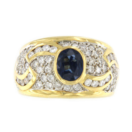 PRIOR 18k yellow gold engagement ring with a central sapphire