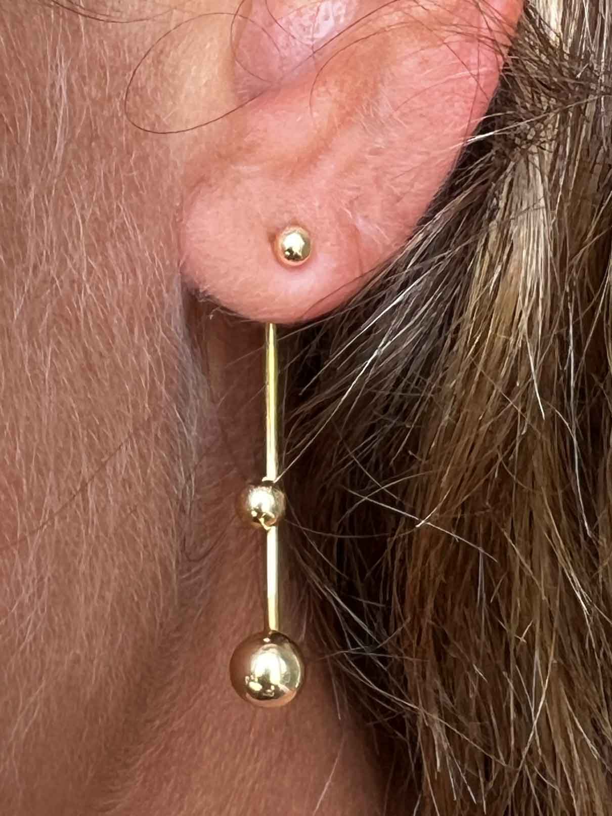 Pendientes originales largos de plata chapada en oro amarillo