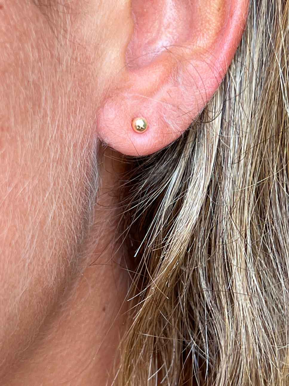 Pendientes originales largos de plata chapada en oro amarillo