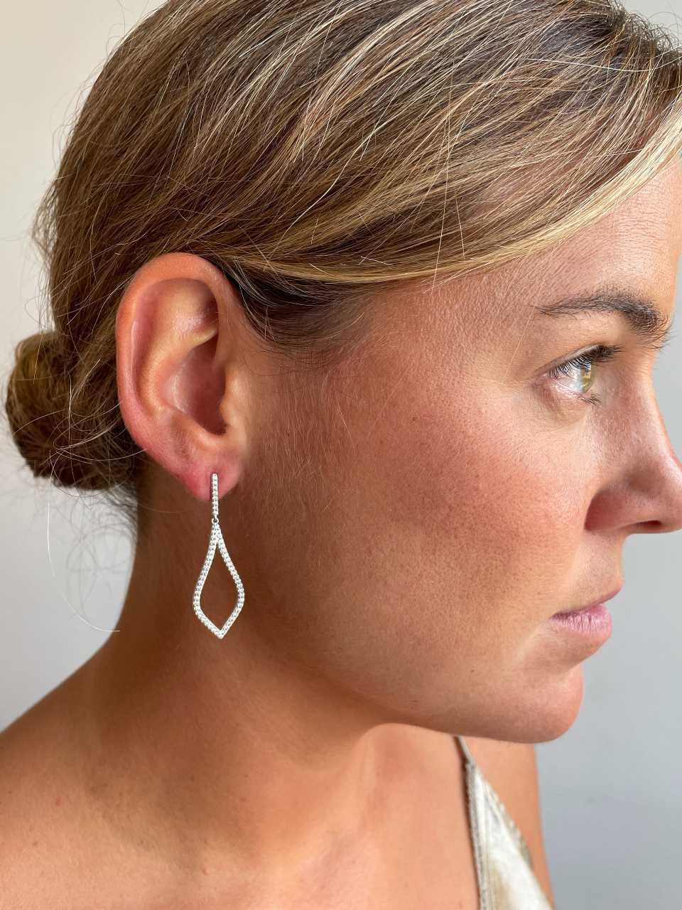 Long GOA earrings in sterling silver with cubic zirconia.