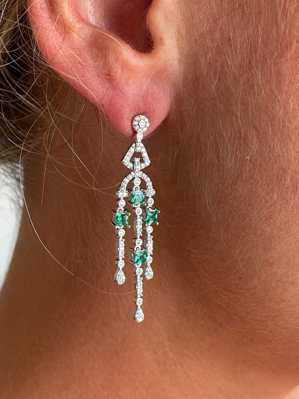 Long WARSAW earrings in white/emerald zircon spikes