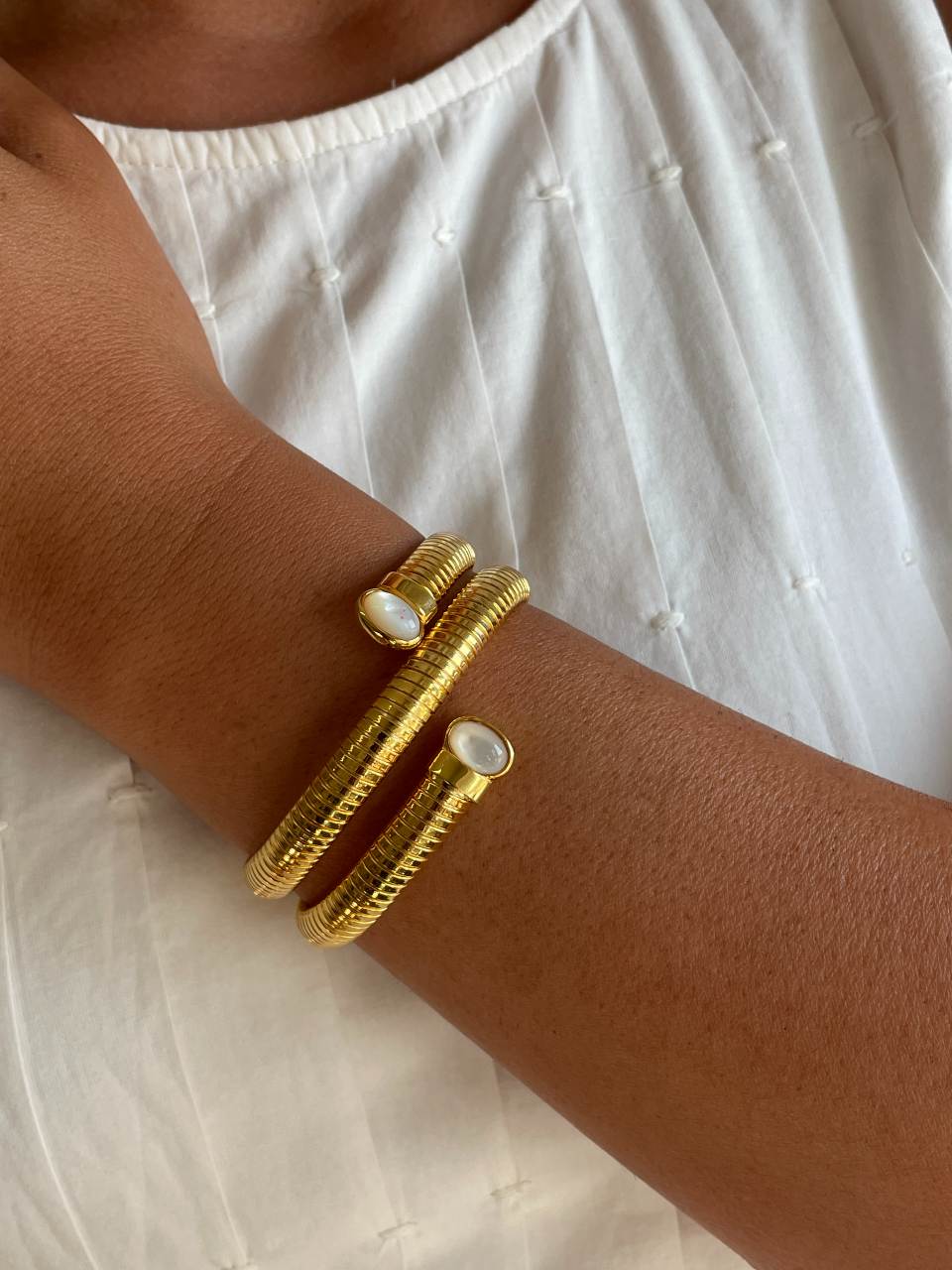 Pulsera NEREA articulada de plata bañada en oro de 18 ktes