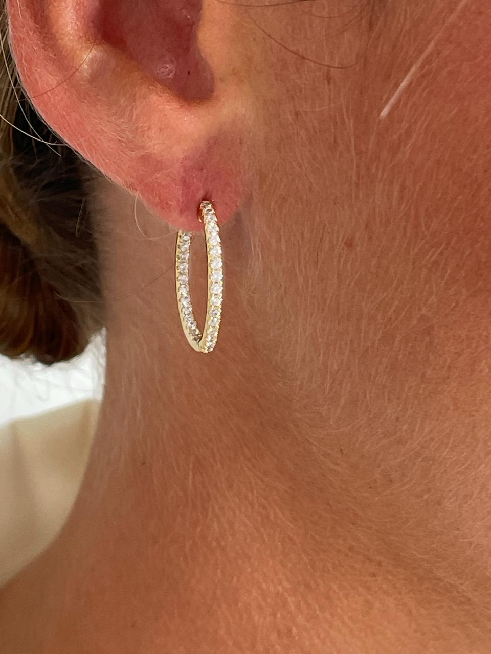 Argollas SANTA LUCIA , de circonitas y plata de ley rodiada/ bañada en oro