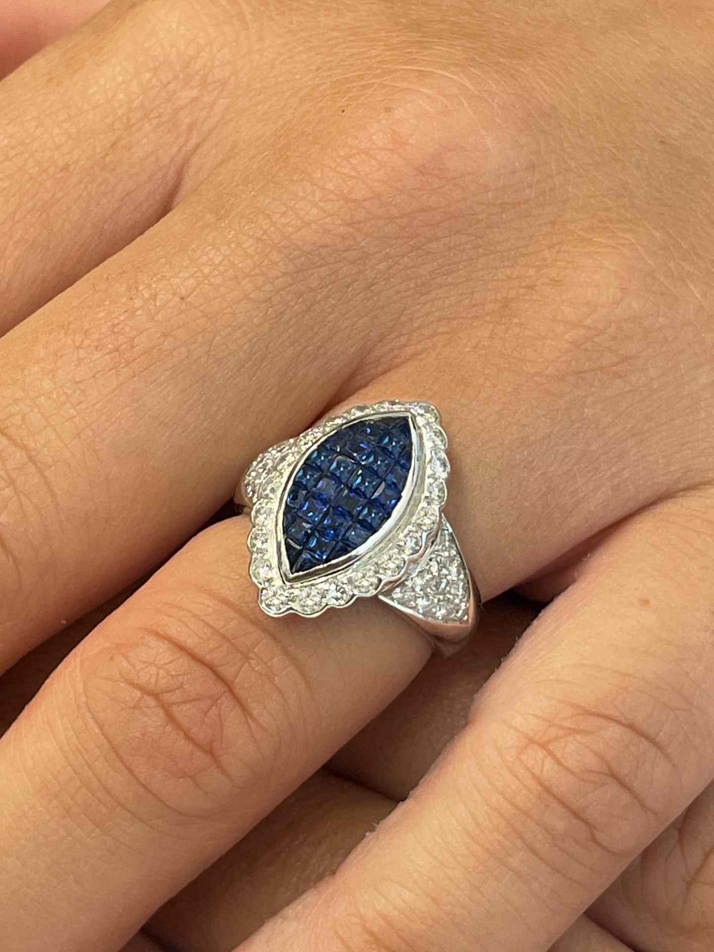 LEGANES ring in 18 karat white gold with sapphires and diamonds.