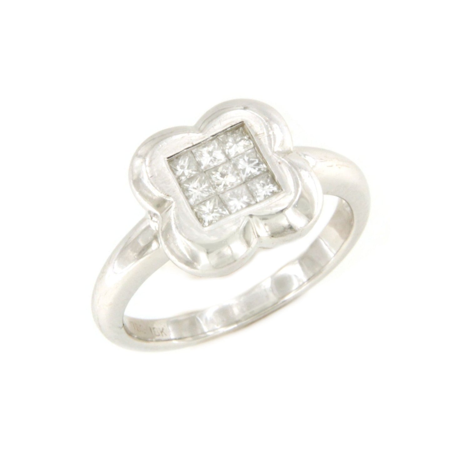 GUADARRAMA ring in 18k white gold with princess diamonds.