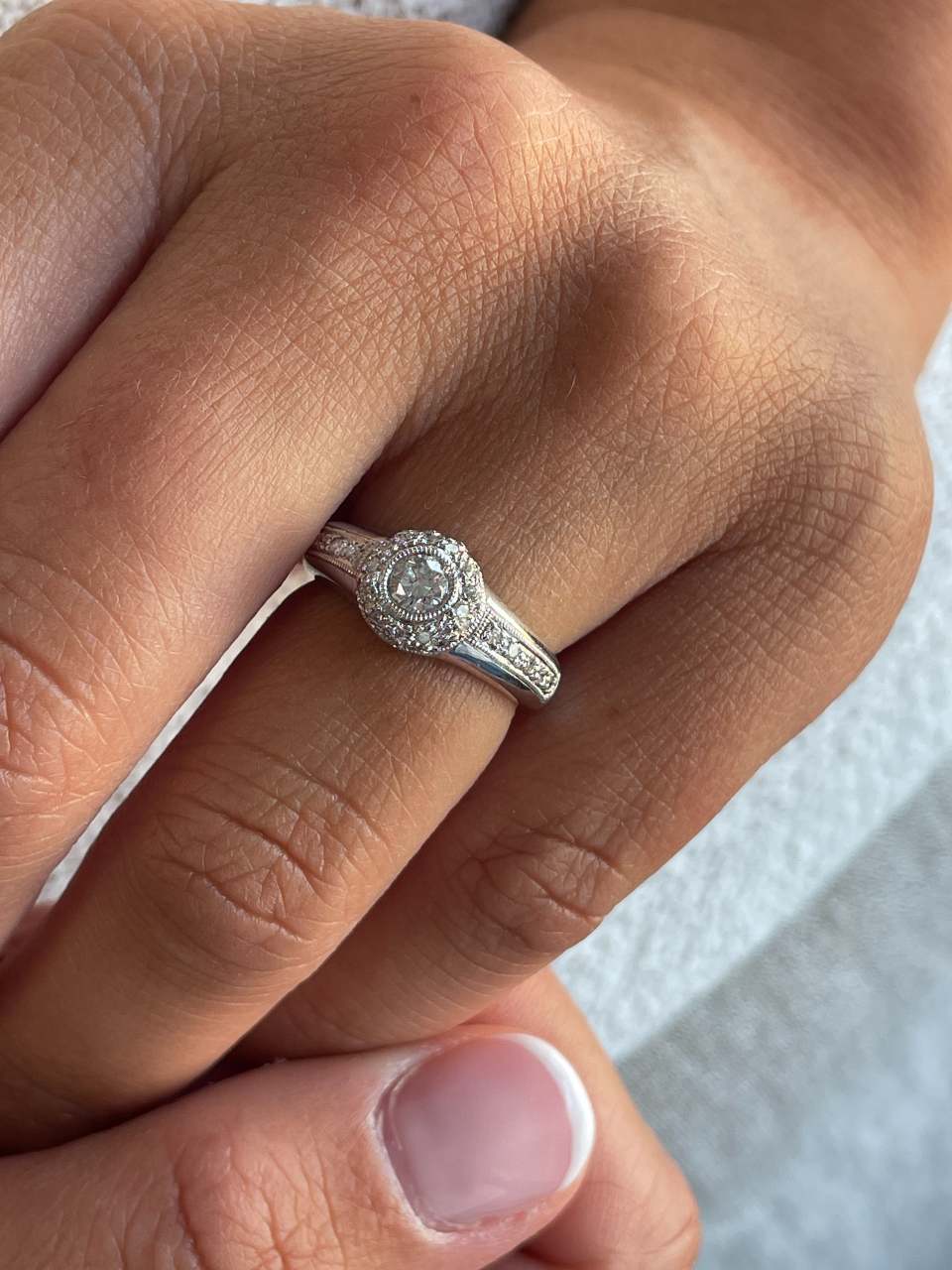 SENS solitaire ring with diamonds in 18-karat white gold