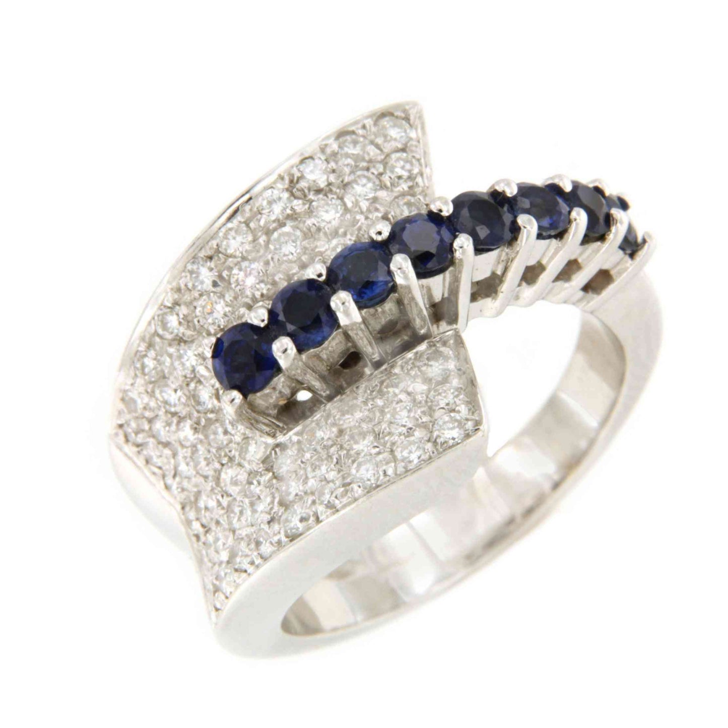 Anillo COSLADA en oro blanco 18 kilates con zafiros y brillantes.