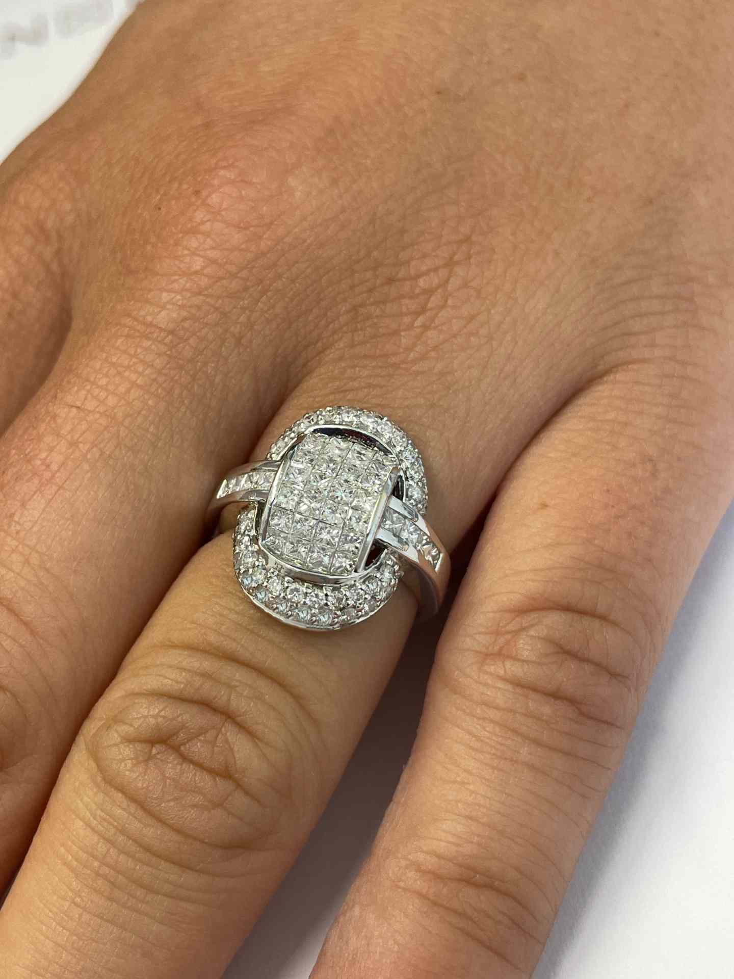 OLIVARES ring in 18k white gold with diamonds and princesses.