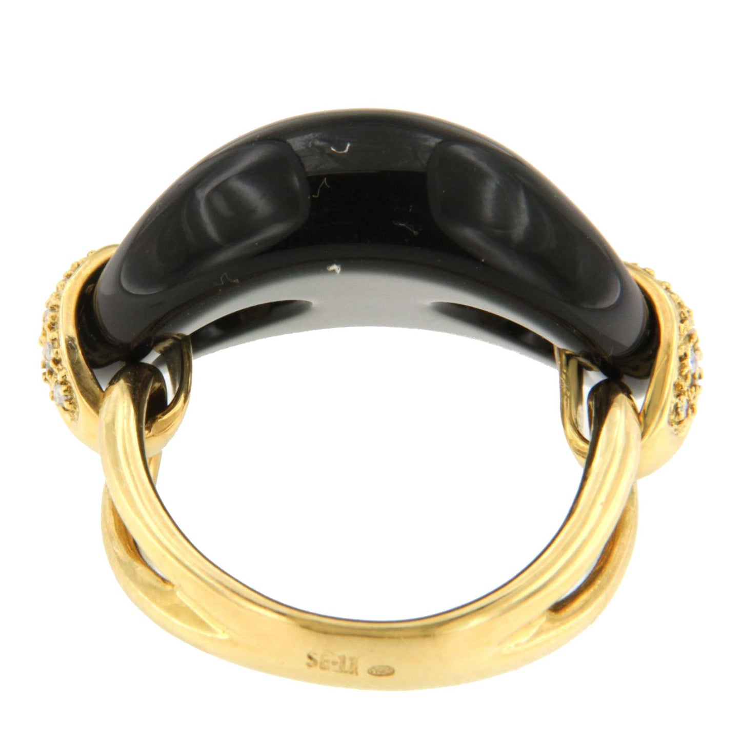 Anillo FIGUERAS en oro amarillo 18 kilates con onix y brillantes.