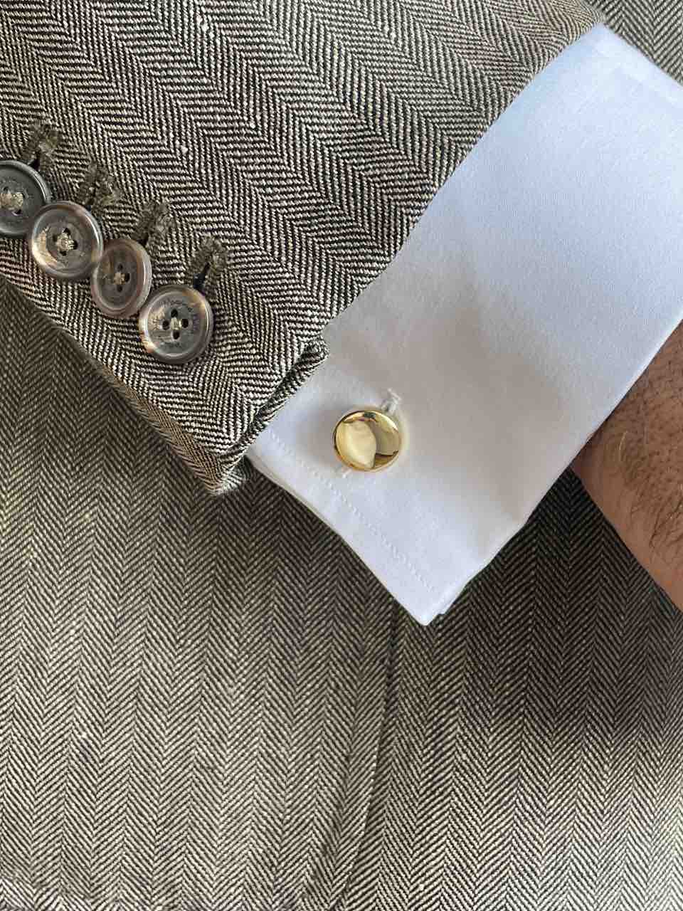 TRAVIESO round cufflinks in 18-karat yellow gold
