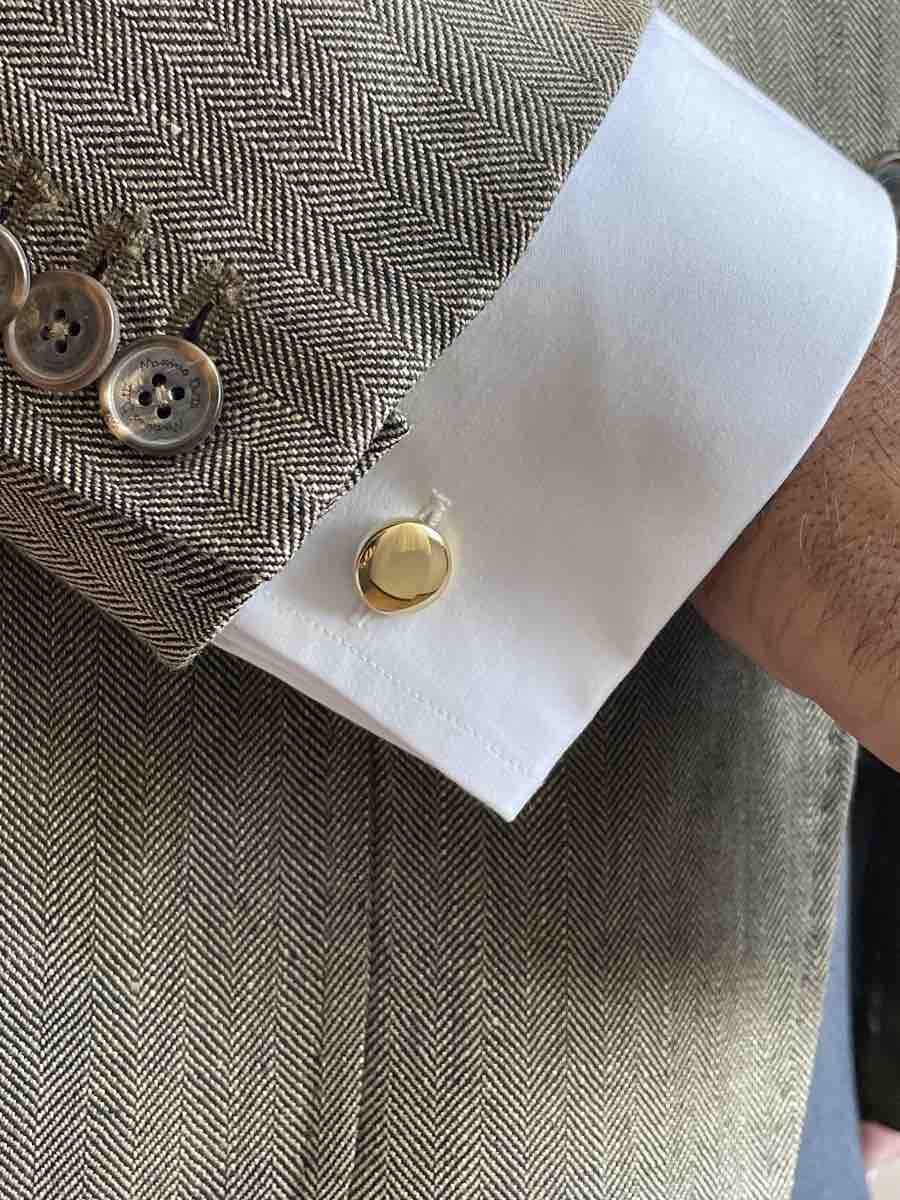 TRAVIESO round cufflinks in 18-karat yellow gold