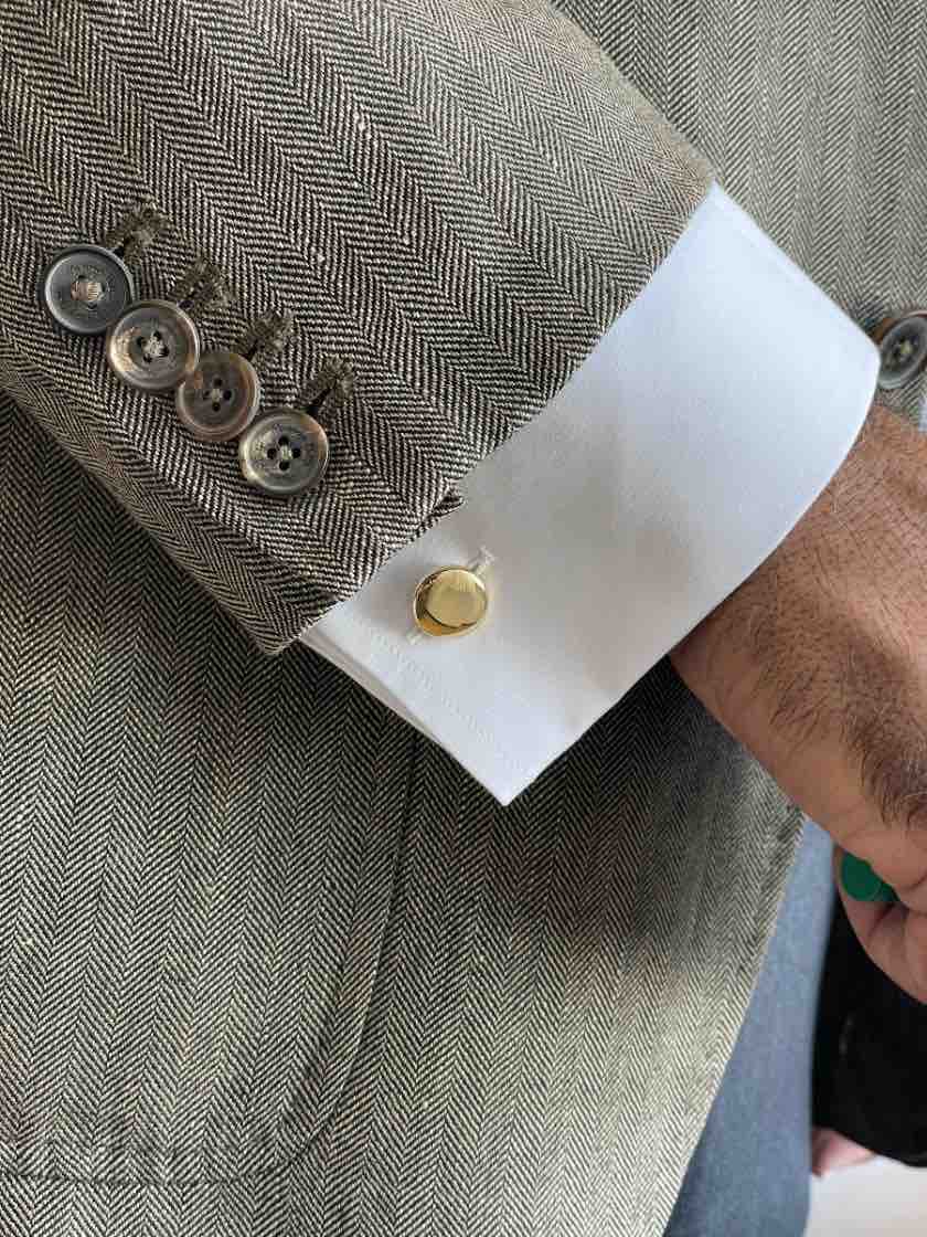 TRAVIESO round cufflinks in 18-karat yellow gold