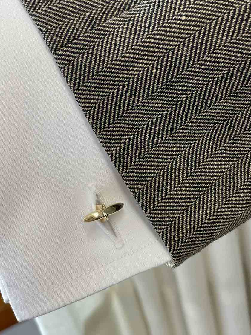 TRAVIESO round cufflinks in 18-karat yellow gold