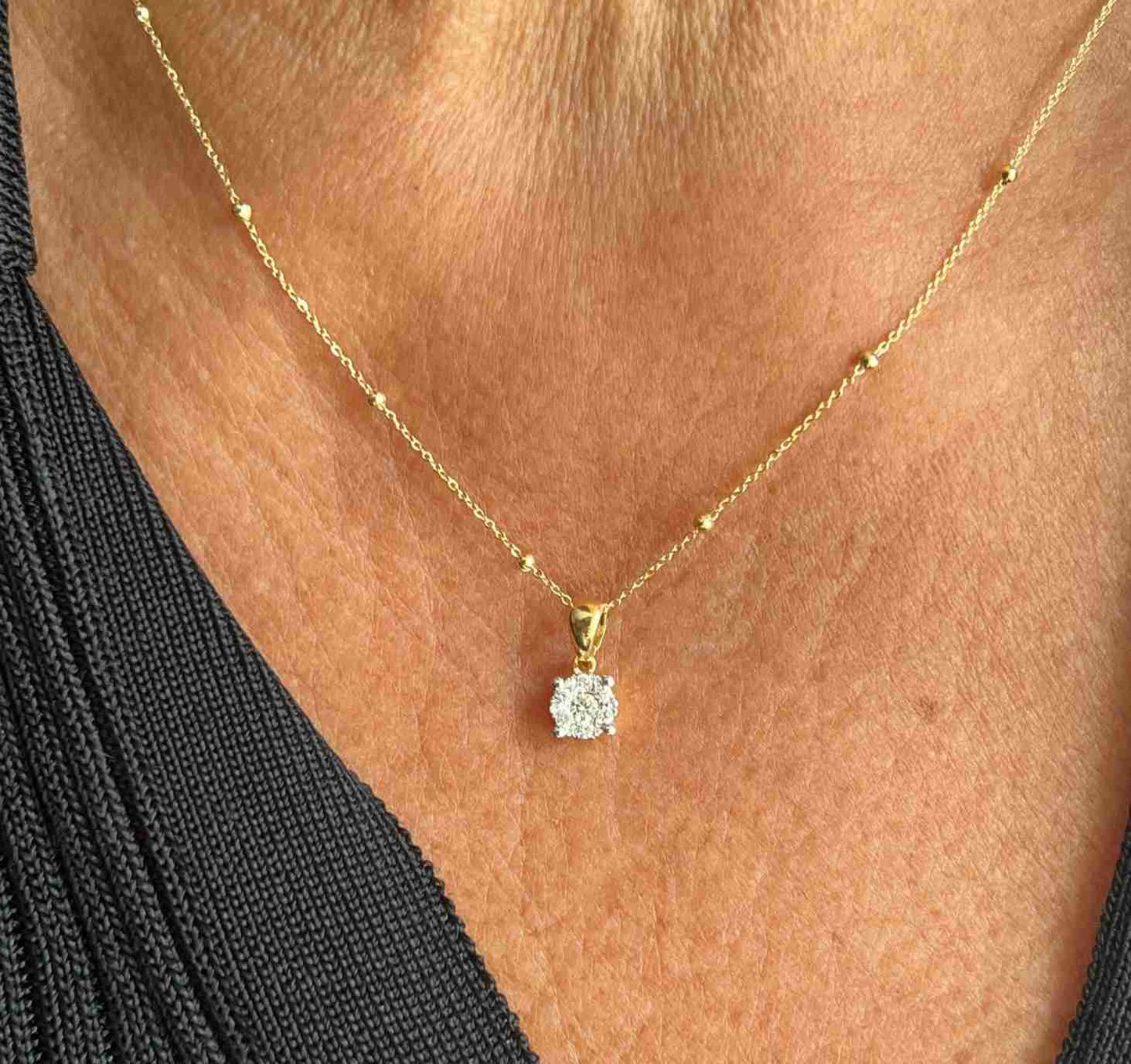 NESRIN pendant mounted in white/yellow gold with diamond and plain bail