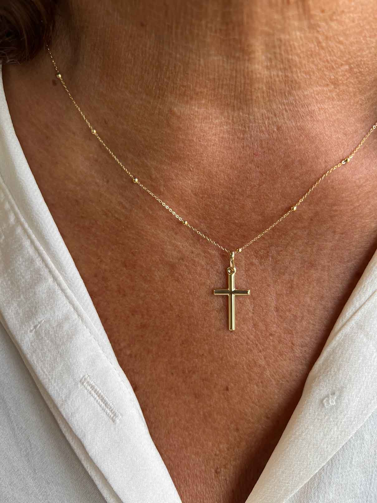 TOLON, Small cross in 18-karat yellow gold