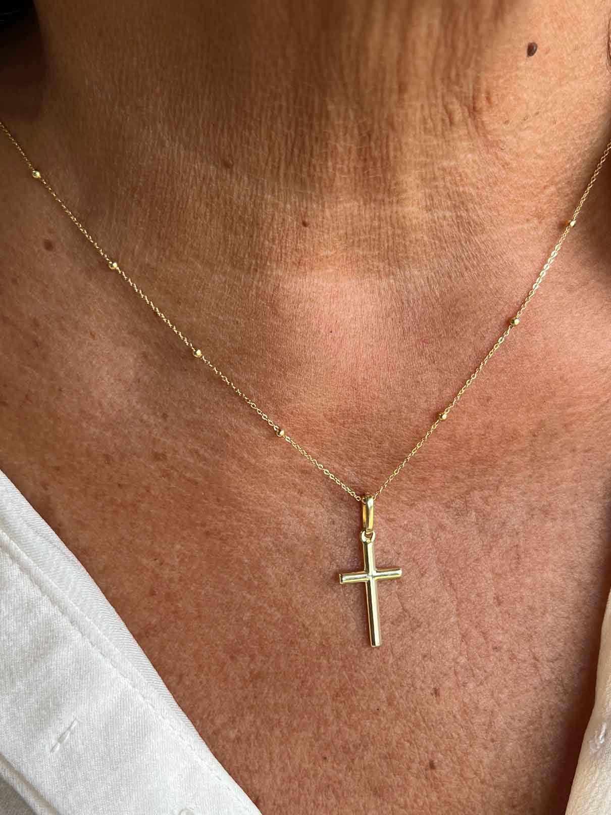 TOLON, Small cross in 18-karat yellow gold