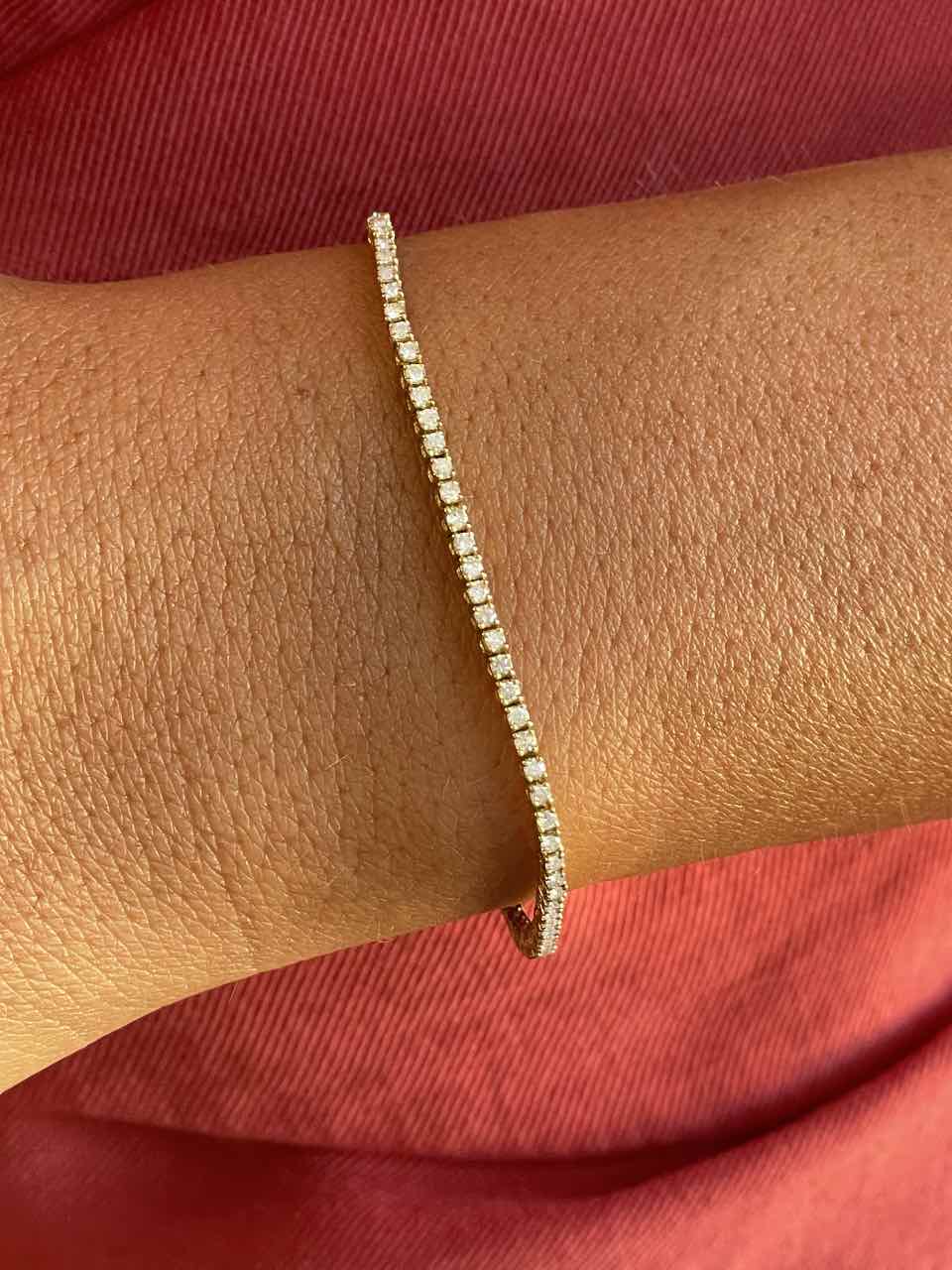 Pulsera riviere ZEZENA en oro amarillo de 18 kilates con brillantes