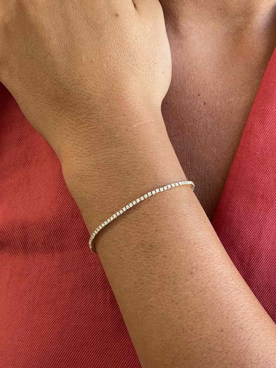 Pulsera riviere ZEZENA en oro amarillo de 18 kilates con brillantes