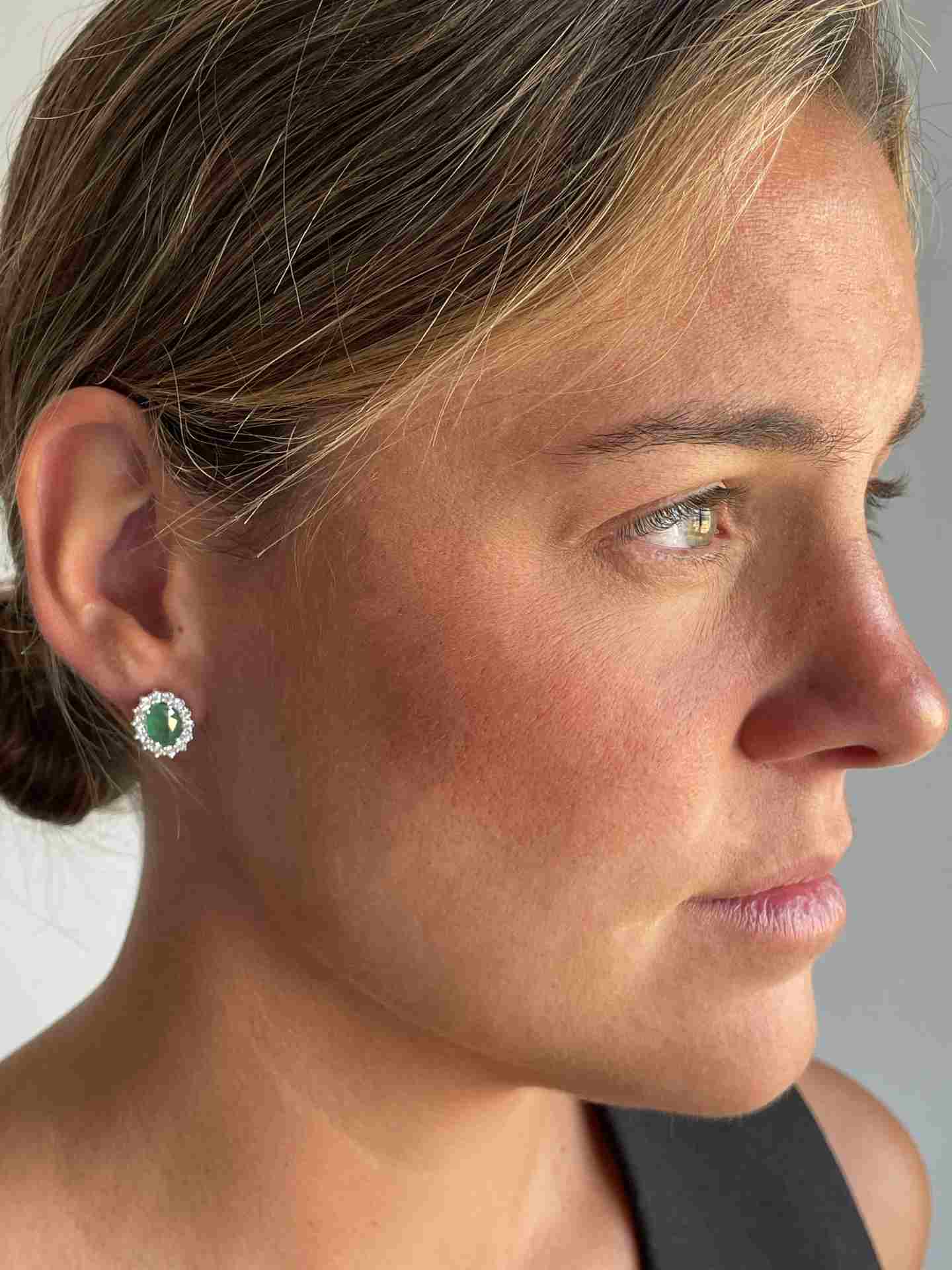 Caribbean emerald and diamond rosette pendant in white gold