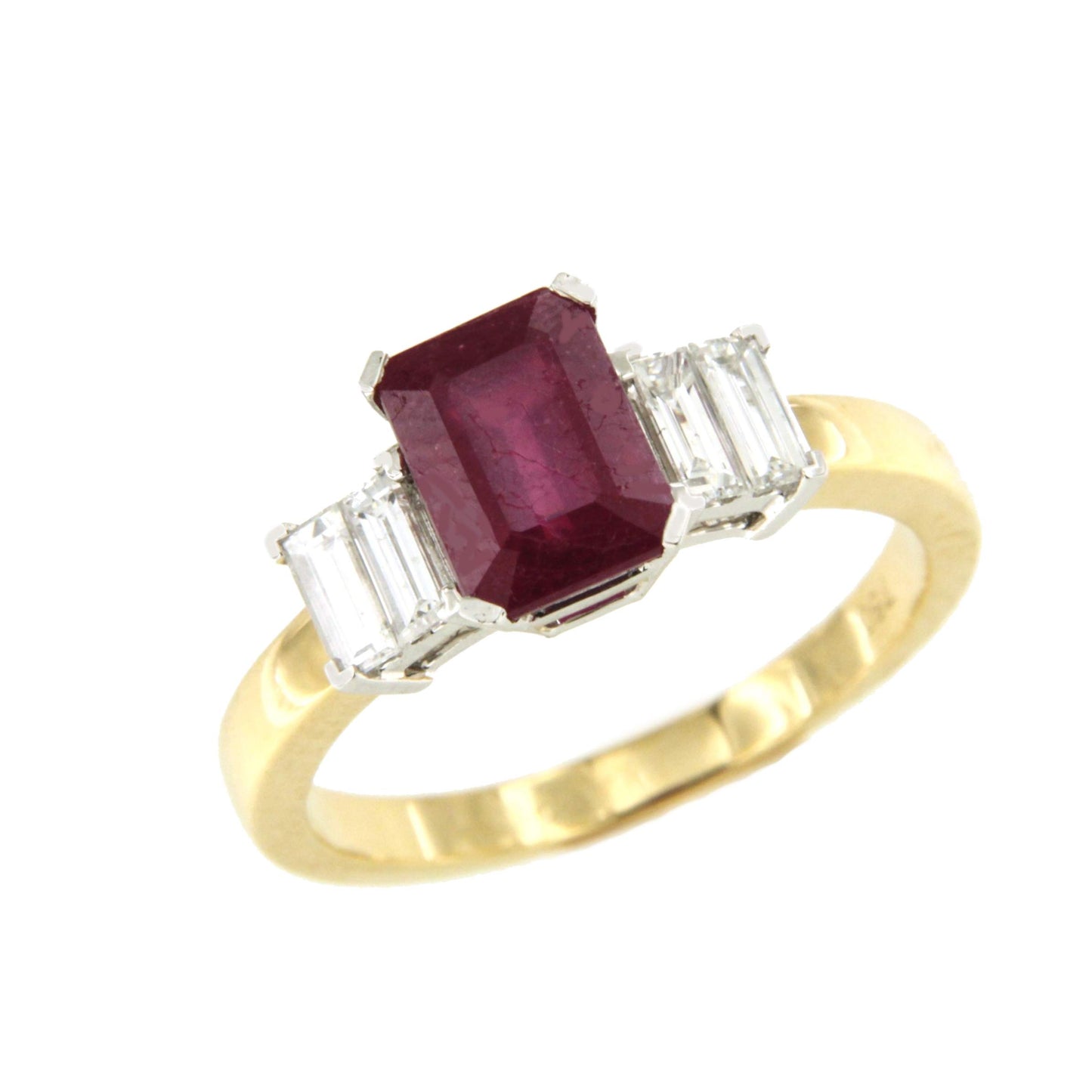 Anillo TALADOR en oro 18 ktes centro talla esmeralda con baguettes
