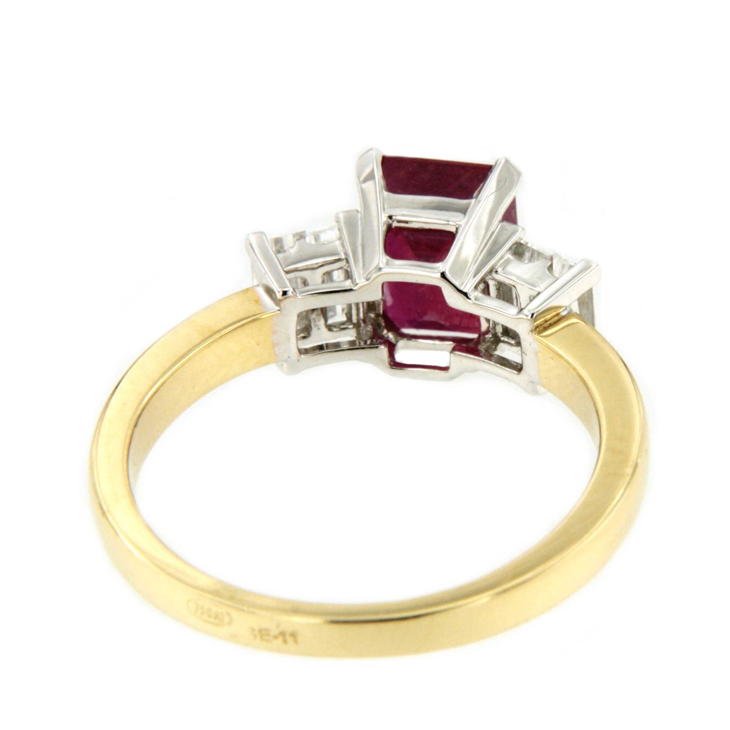 Anillo TALADOR en oro 18 ktes centro talla esmeralda con baguettes