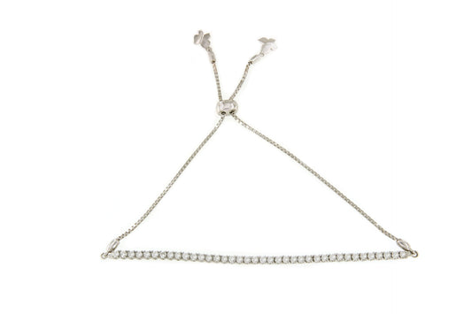 LE MANS adjustable diamond riviere bracelet in 18k white gold.