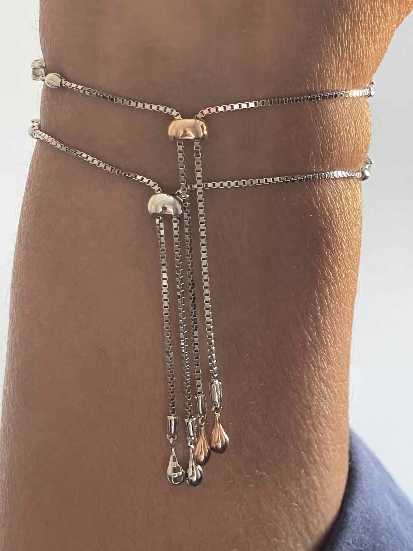 Pulsera ALBI riviere ajustable en oro blanco de 18 ktes con brillantes.