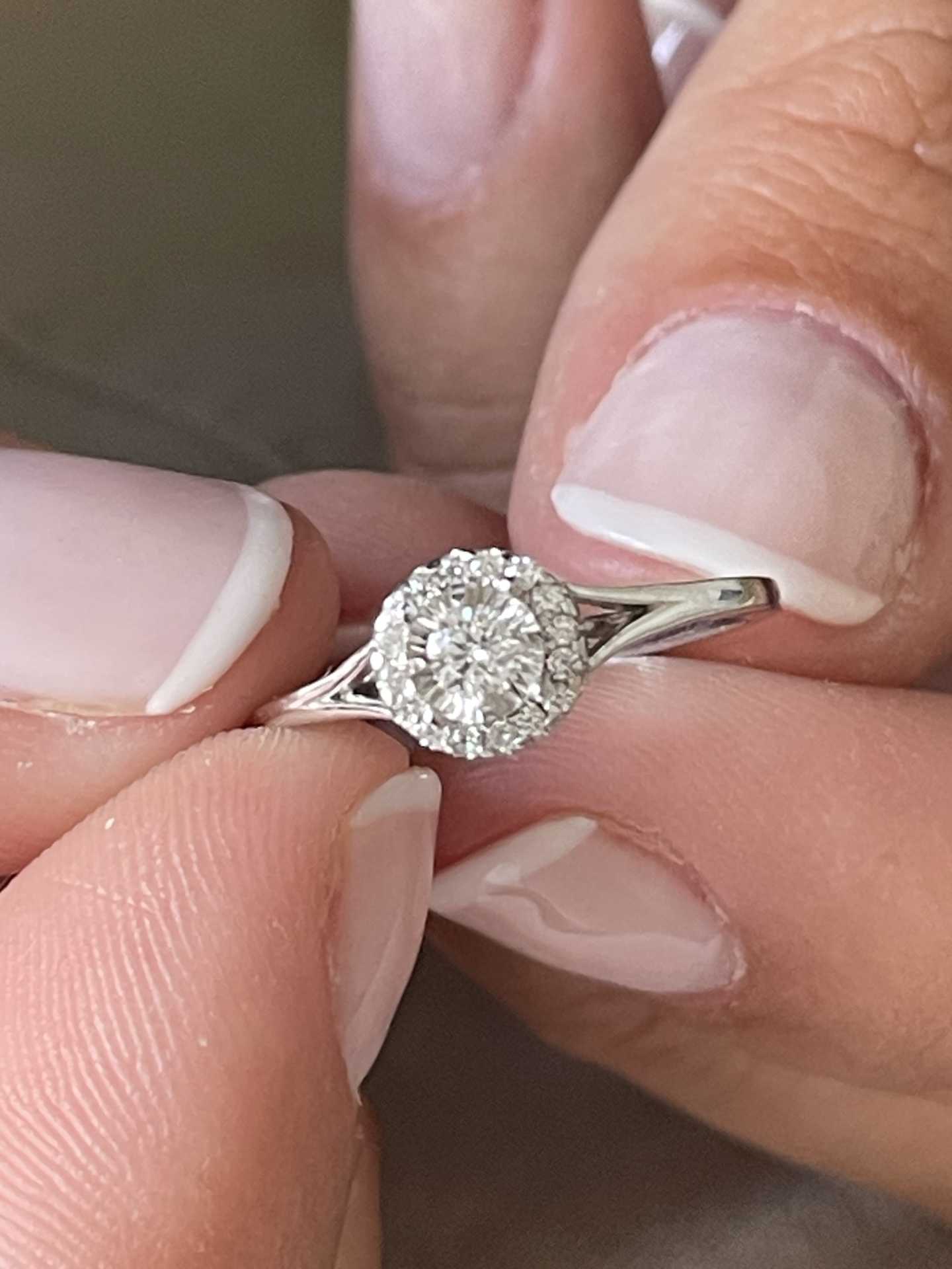 QUIMPER solitaire ring surrounded by a brilliant-cut diamond in 18k white gold.