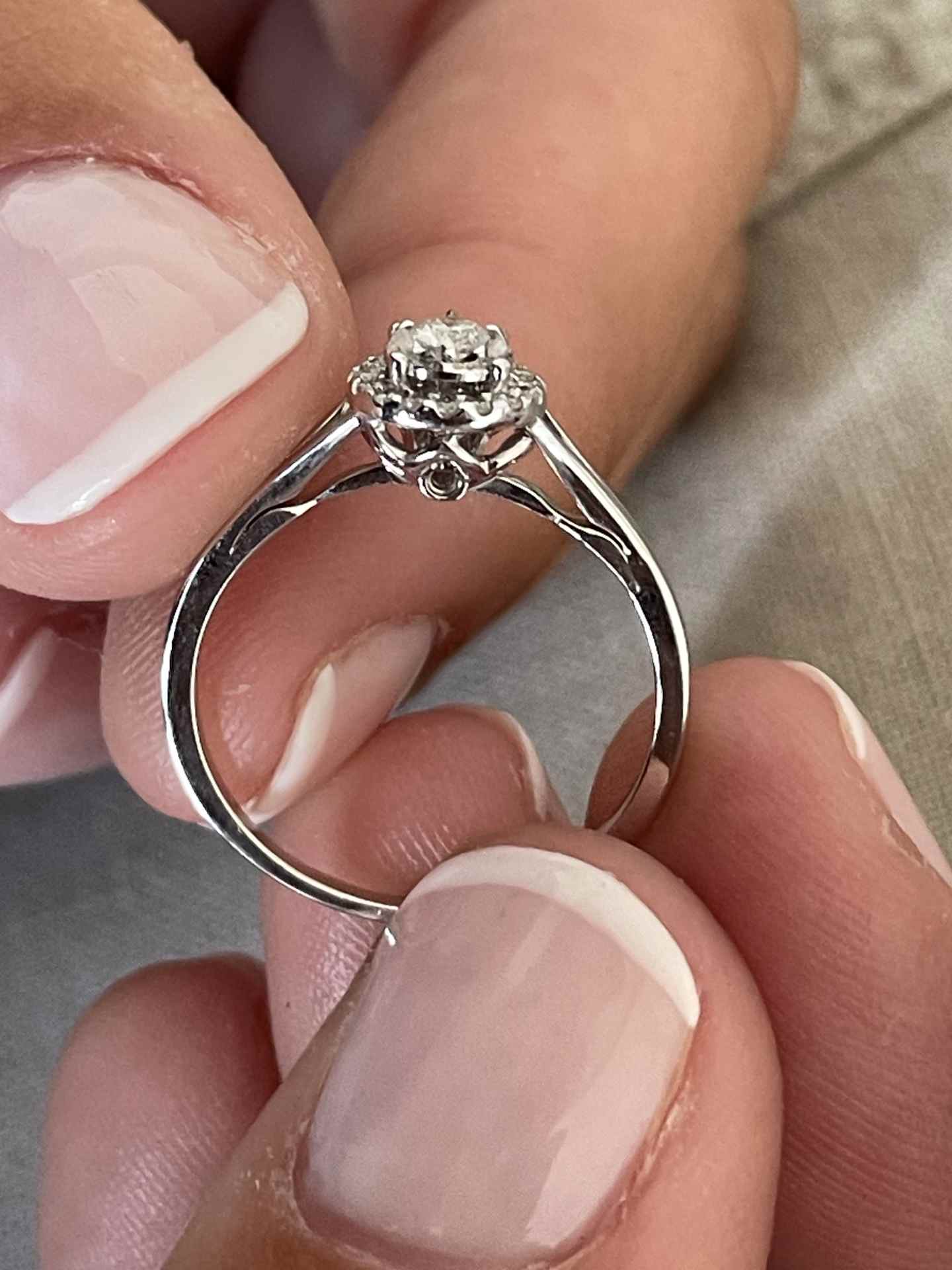 QUIMPER solitaire ring surrounded by a brilliant-cut diamond in 18k white gold.