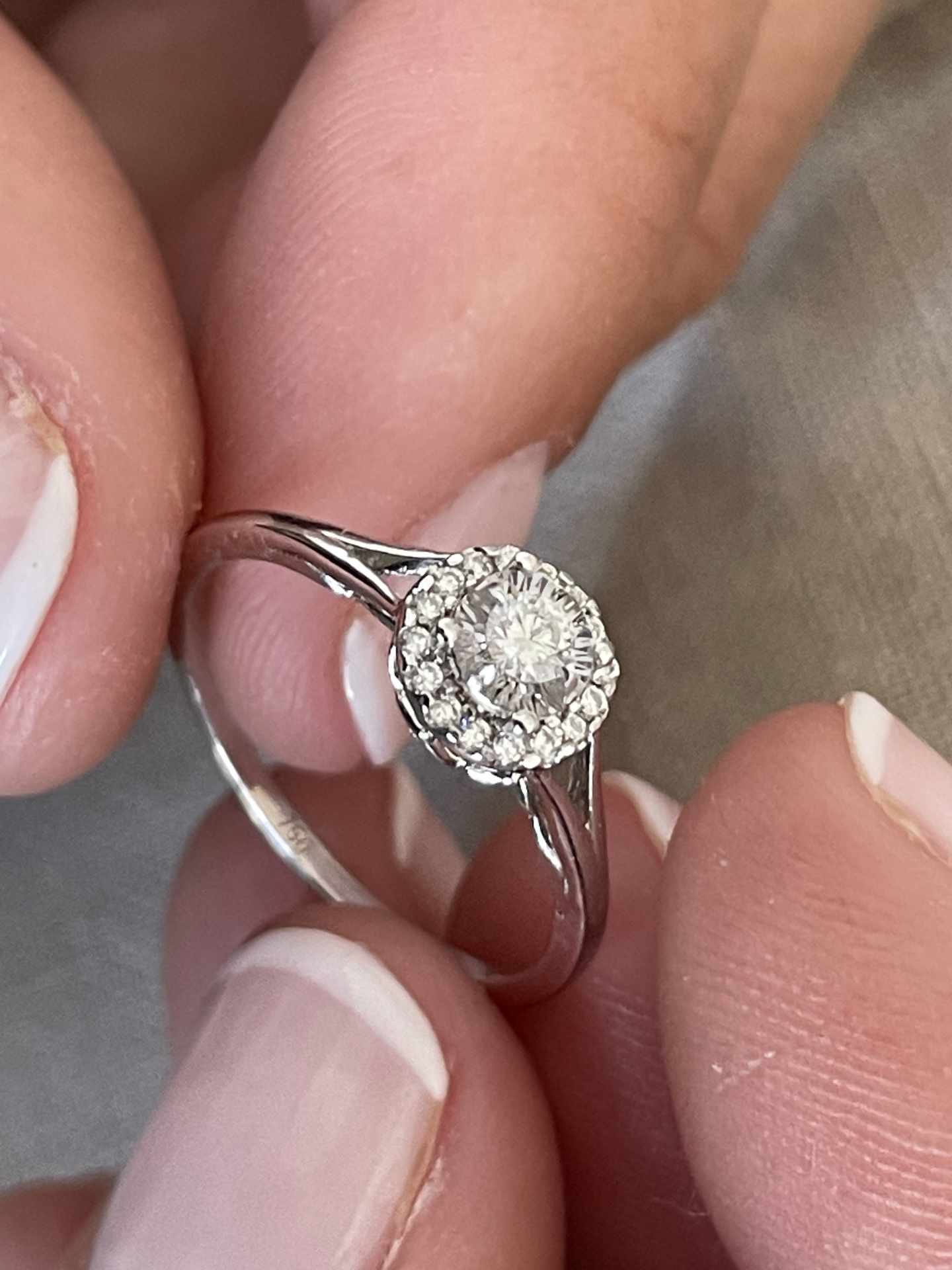 QUIMPER solitaire ring surrounded by a brilliant-cut diamond in 18k white gold.