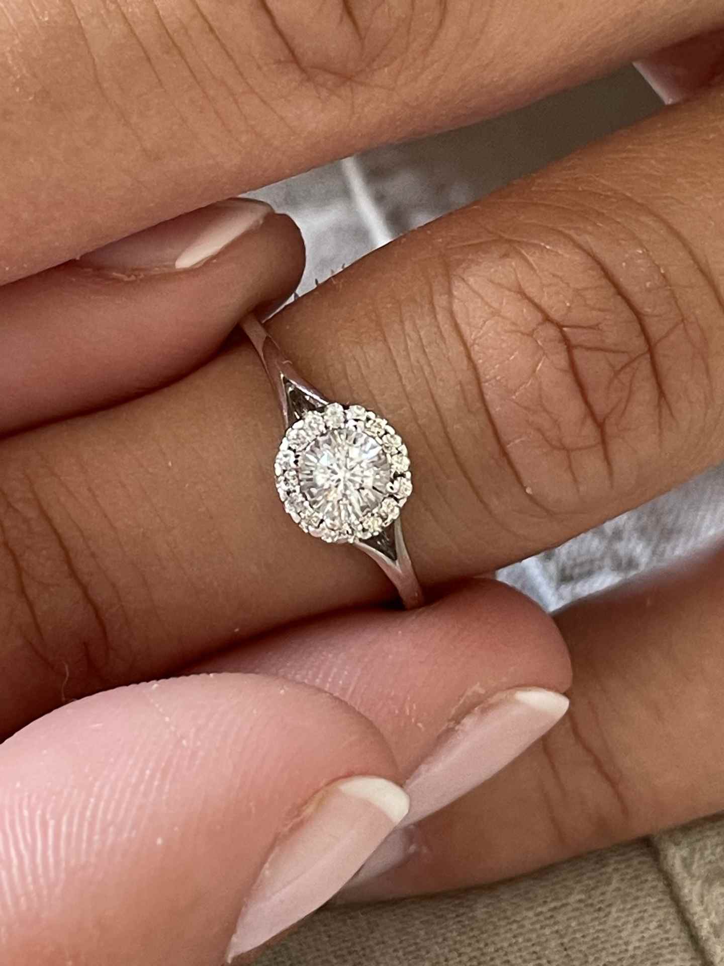 QUIMPER solitaire ring surrounded by a brilliant-cut diamond in 18k white gold.