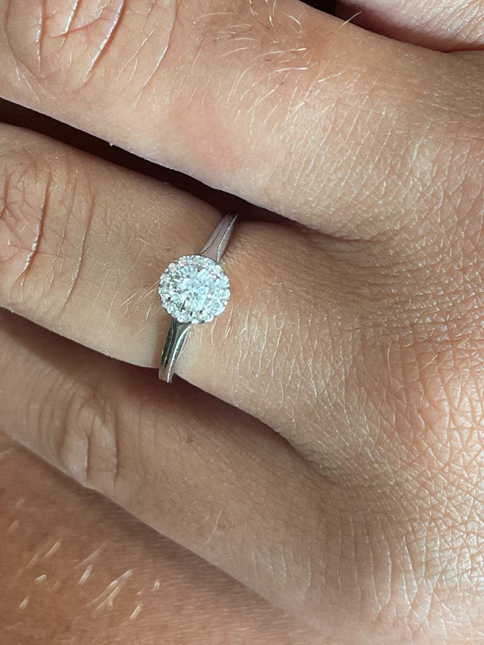 SENS solitaire ring with diamonds in 18-karat white gold