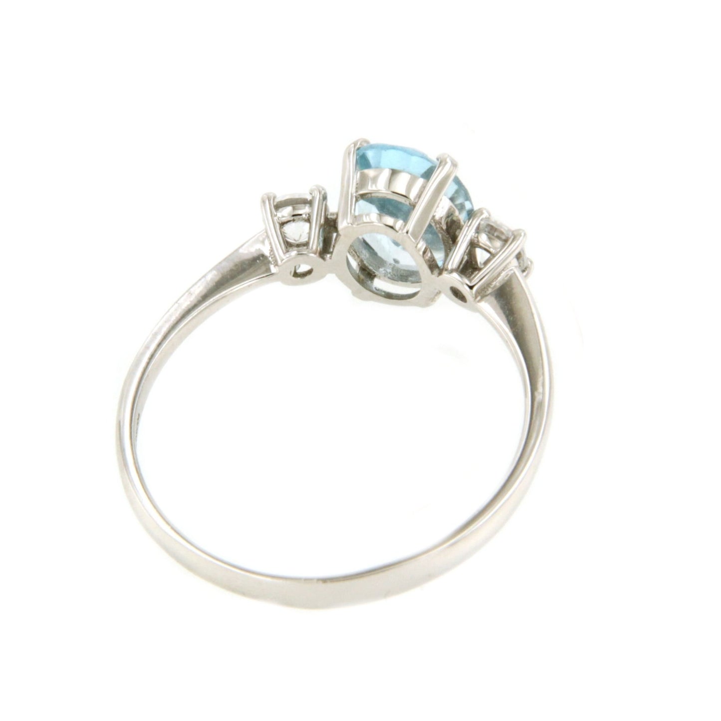 Anillo ESENCIA en oro blanco de 18 kilates con circonitas y topacio azul