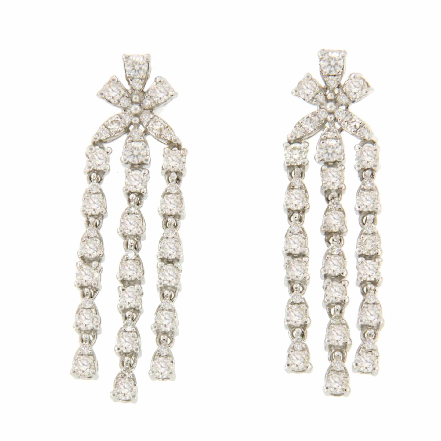 RIBADEOS long 18k white gold earring with diamonds.