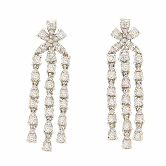 RIBADEOS long 18k white gold earring with diamonds.