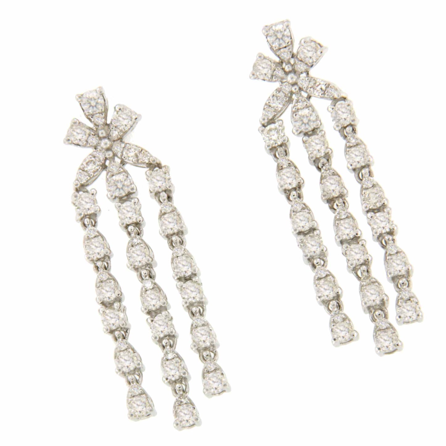 RIBADEOS long 18k white gold earring with diamonds.