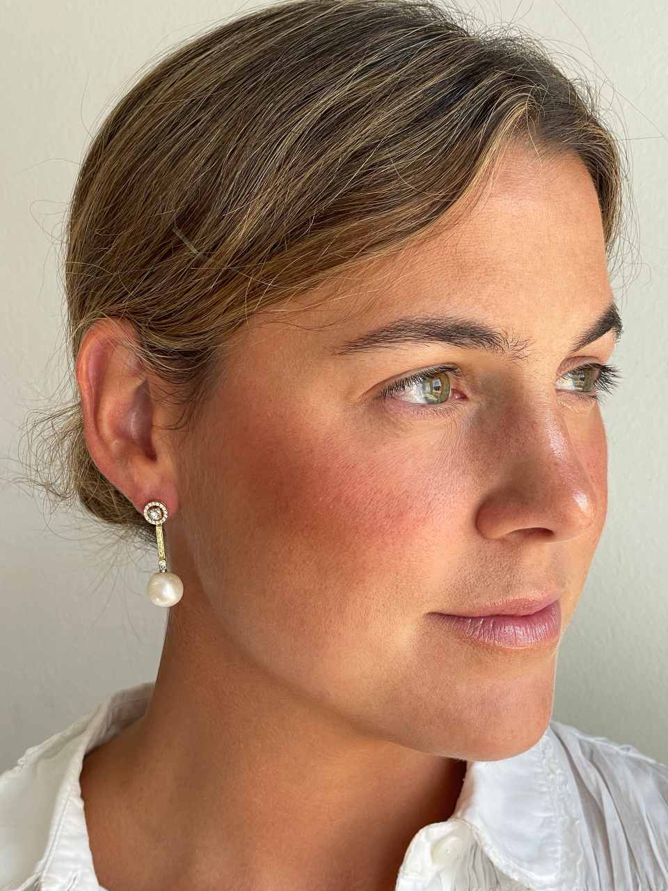 MUNICH detachable earrings in 18k yellow and white gold with diamonds.