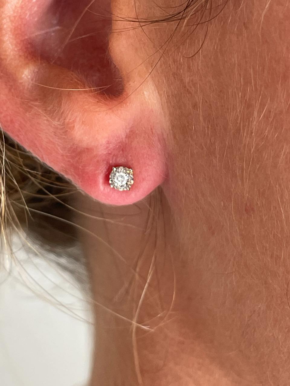 MUNICH detachable earrings in 18k yellow and white gold with diamonds.