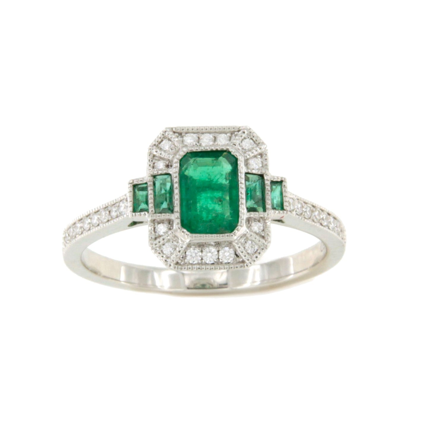 Anillo DORTMUND roseta esmeralda baguettes y brillantes en oro blanco 18 ktes.