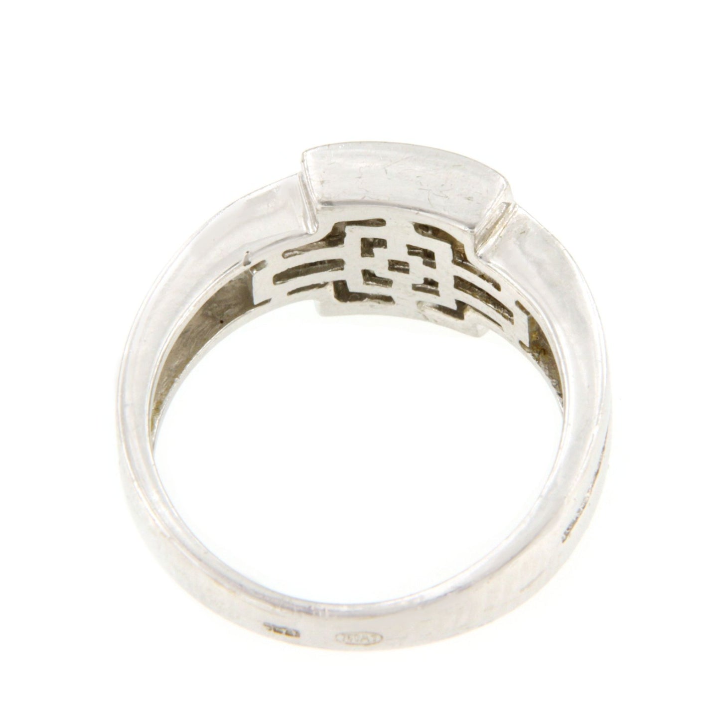 Anillo TOMARES en oro blanco de 18 ktes con diamantes princesas
