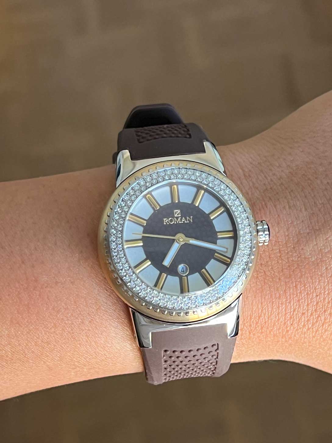 Roman gold and silver watch with brown rubber strap