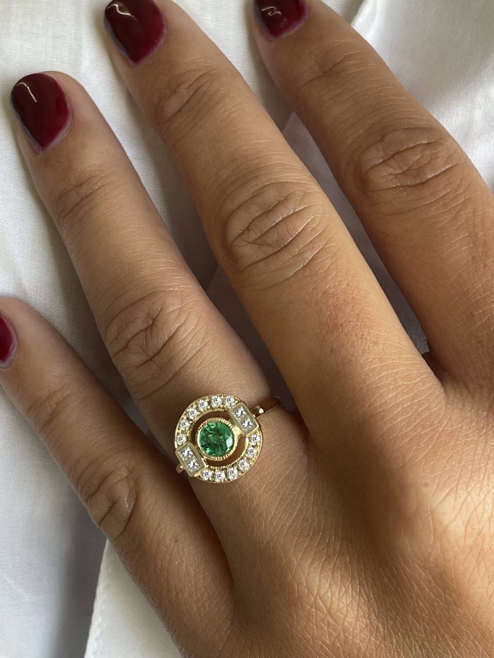 Anillo CAMPANILLA en oro blanco o amarillo de 18 ktes esmeralda y zafiro