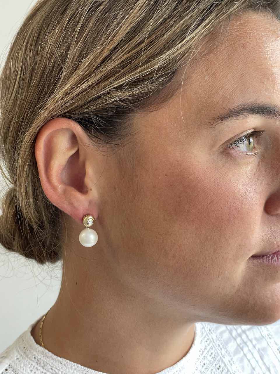 HORNA pendant with diamond bezel in 18k yellow and white gold