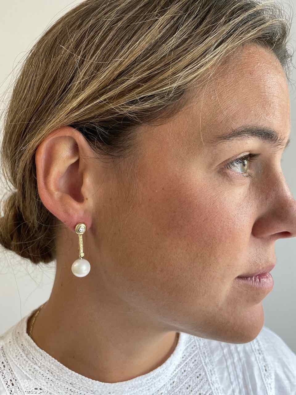 HORNA pendant with diamond bezel in 18k yellow and white gold