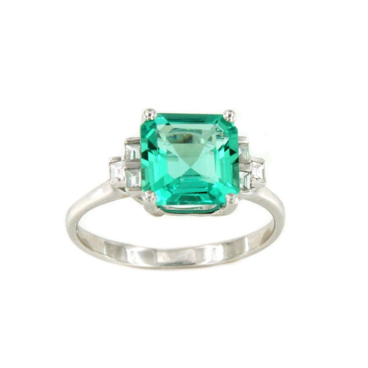 Anillo TOULON esmeralda y diamantes talla baguetes en oro blanco 18 ktes