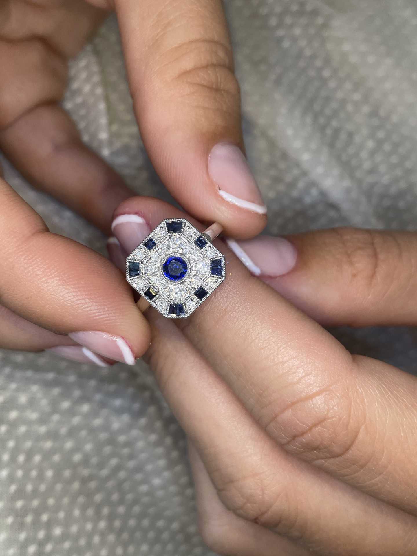 Zebra ring in 18k white gold with diamonds and sapphire in art deco style