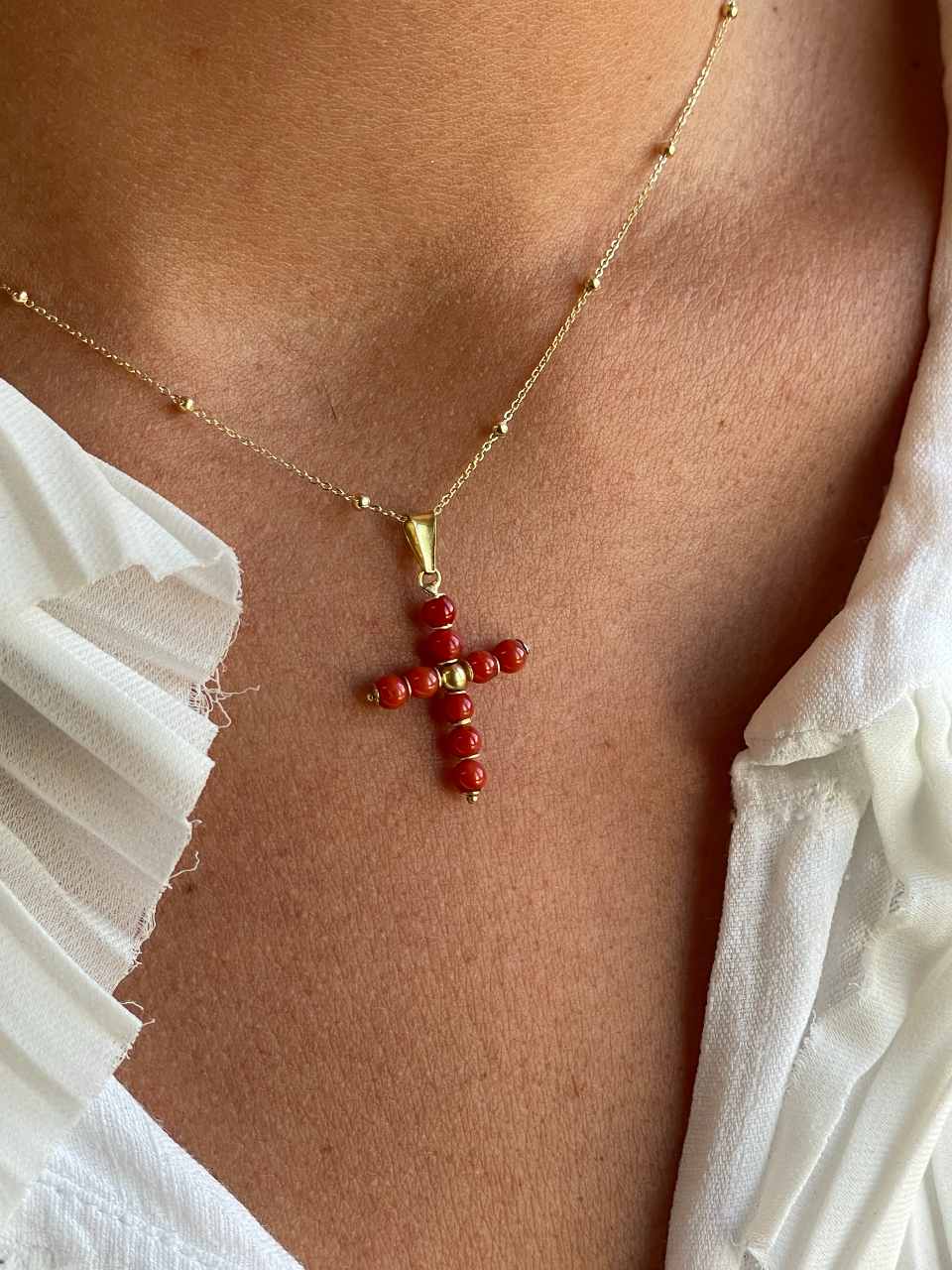 BORA BORA cross pendant in 18k gold and coral