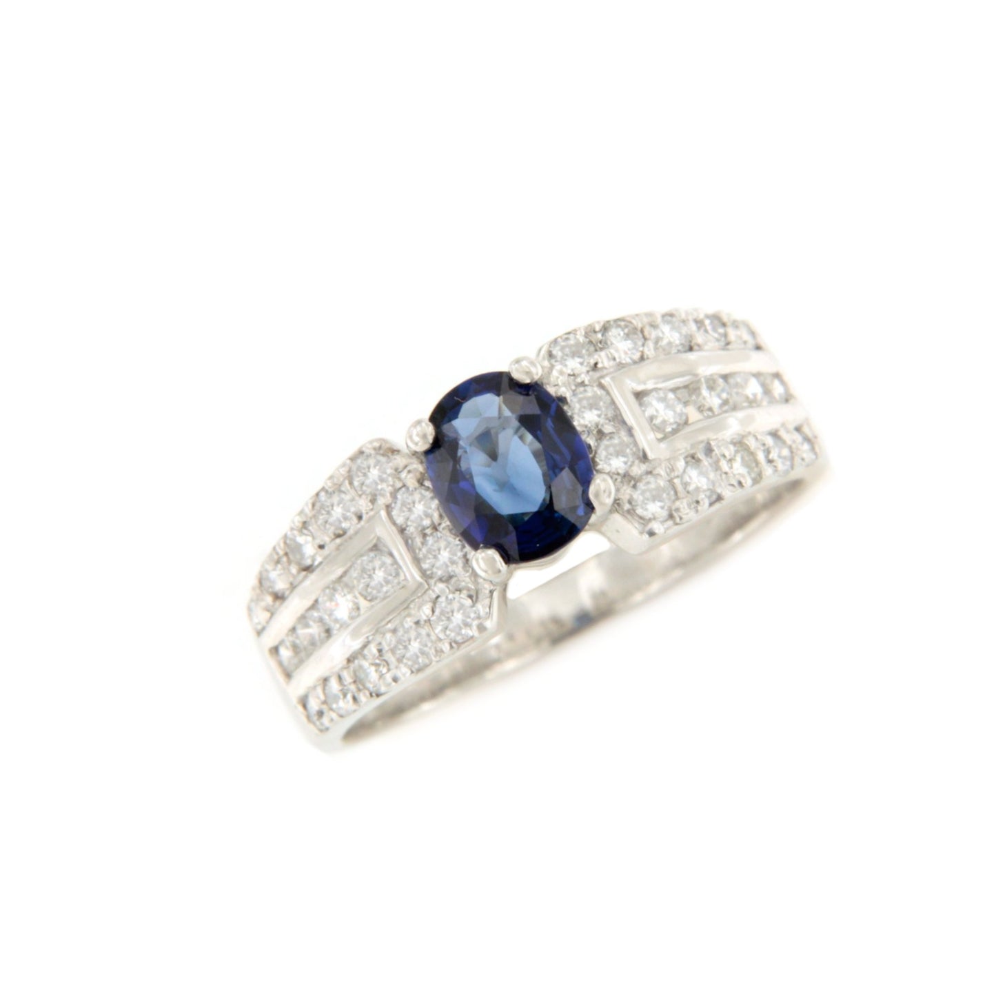 Anillo AZAROLE centro zafiro y diamantes en oro blanco 18 ktes
