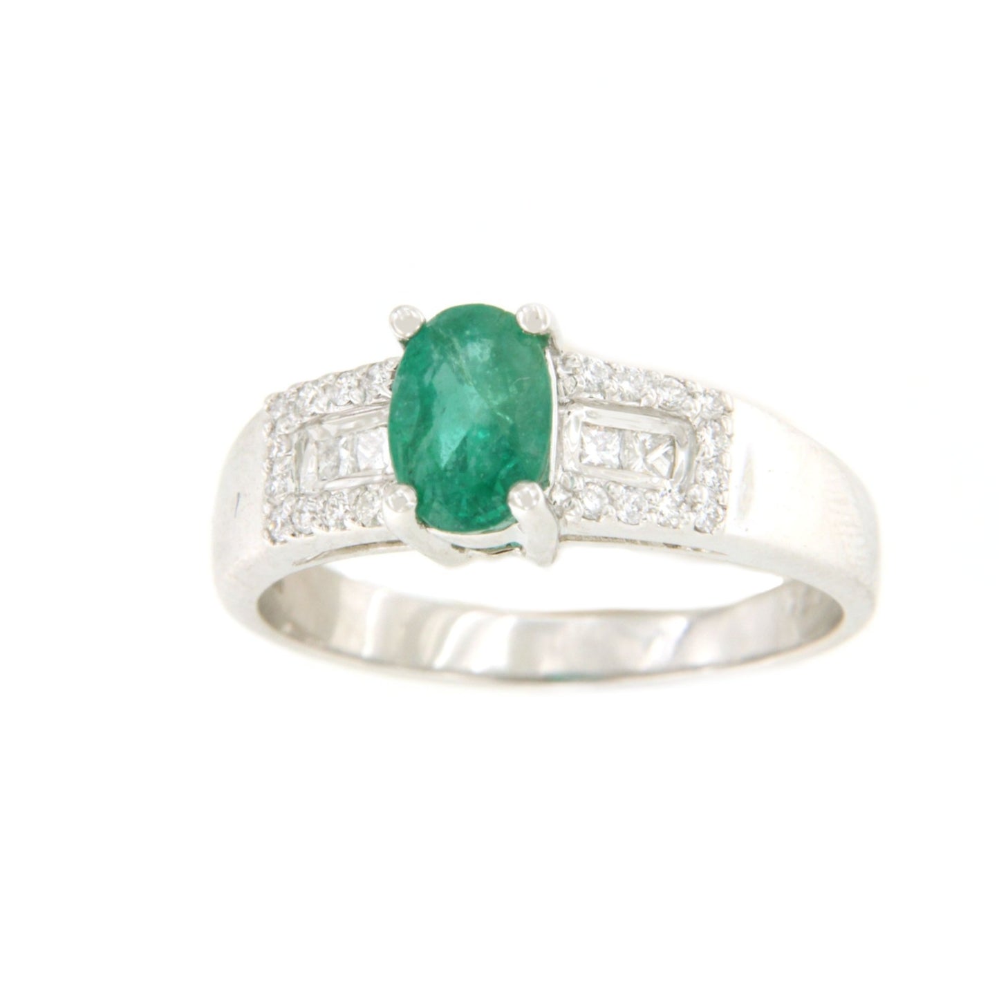 Anillo RIBADEO esmeralda y diamantes en oro blanco 18 ktes .