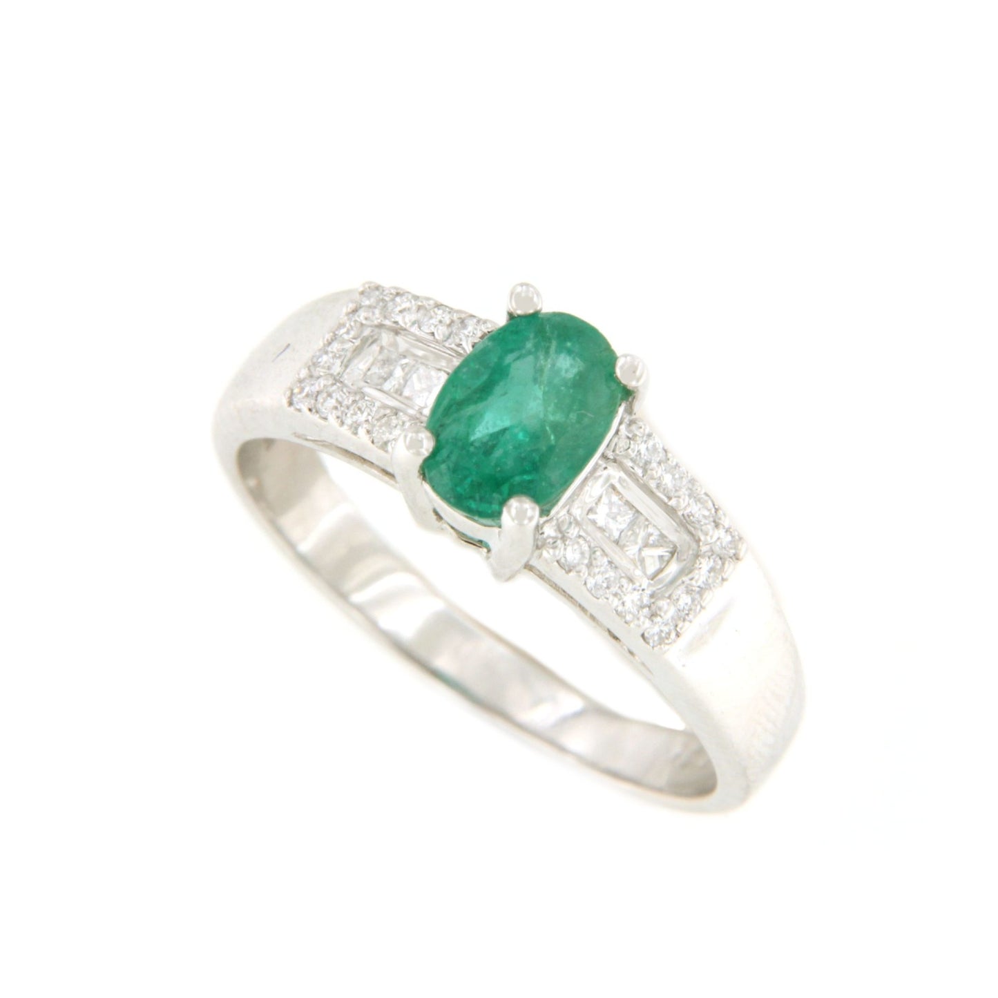 Anillo RIBADEO esmeralda y diamantes en oro blanco 18 ktes .